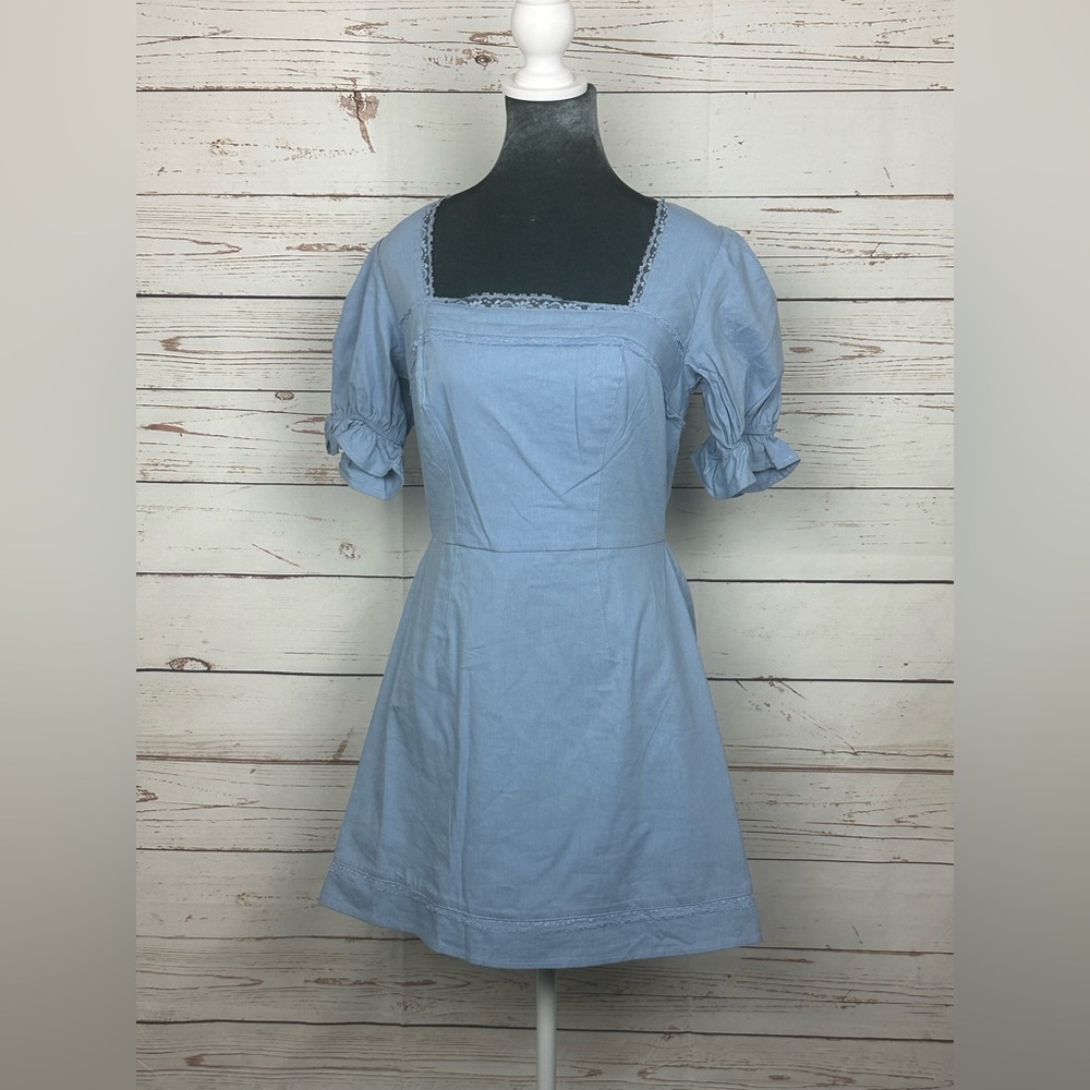 Women’s “and now this” dress